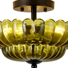 Close-up of the ribbed olive-green glass petal tiers