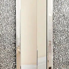 Close-up of the shimmering crushed-crystal inlay framed by bevelled mirror panels