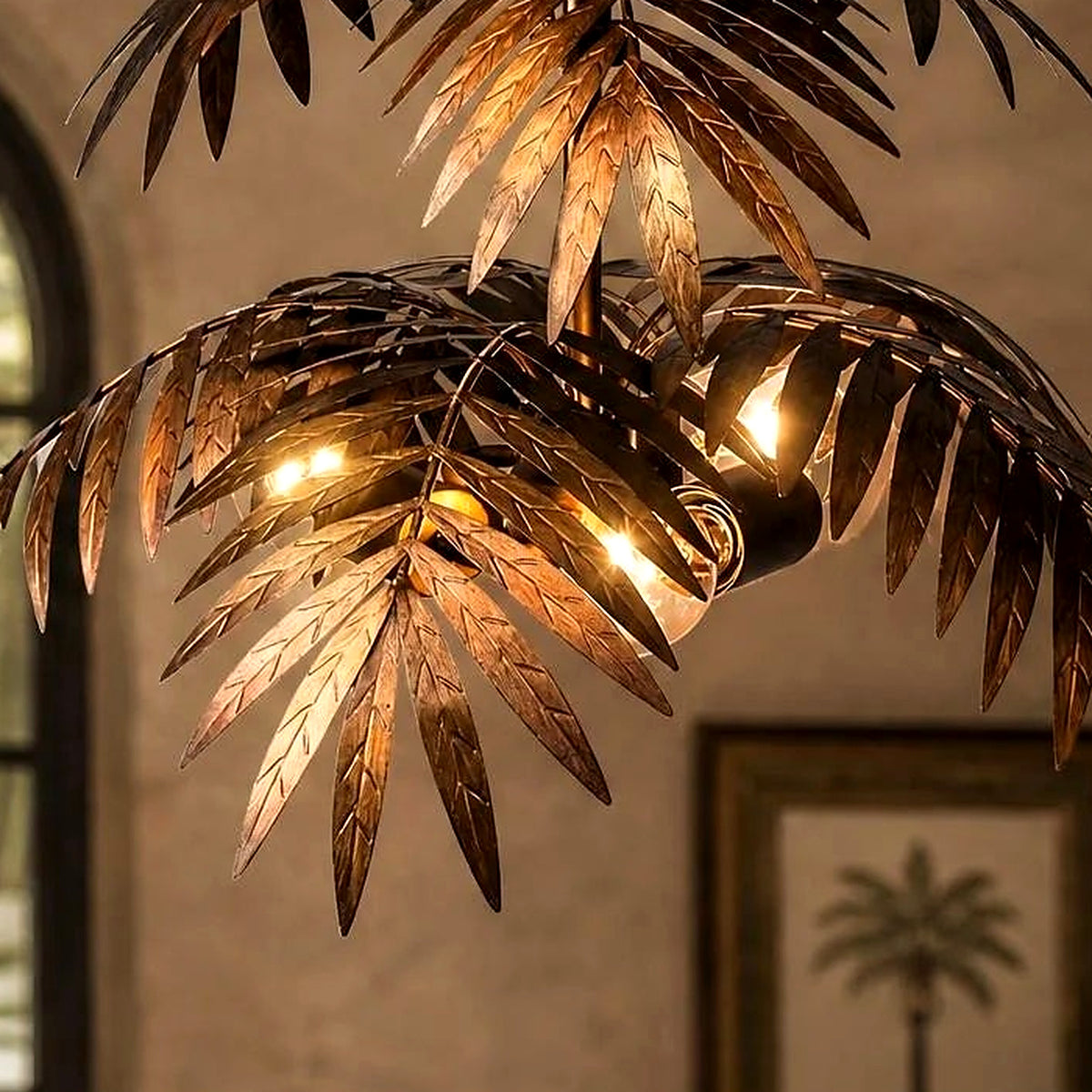 Close-up of veined bronze palm leaves with warm bulbs glowing beneath the lower tier