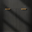 Close-up of the vertical fluting and brushed gold bar pull on the black vanity