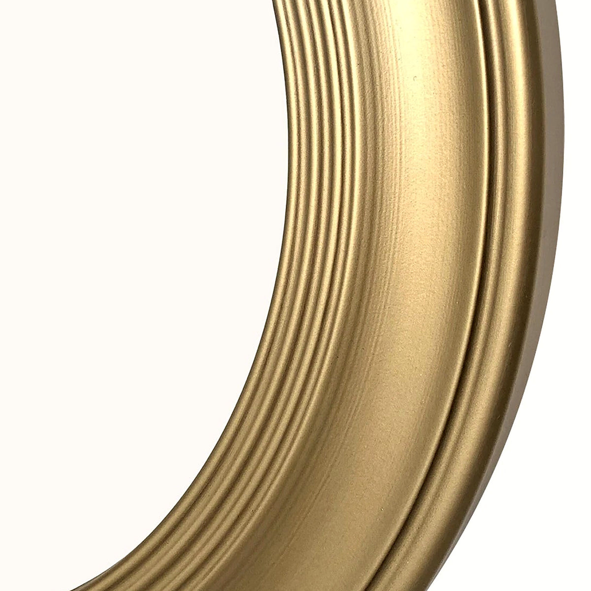 Close-up of the stepped brushed gold frame texture