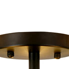 Detail of the dark metal canopy and stem