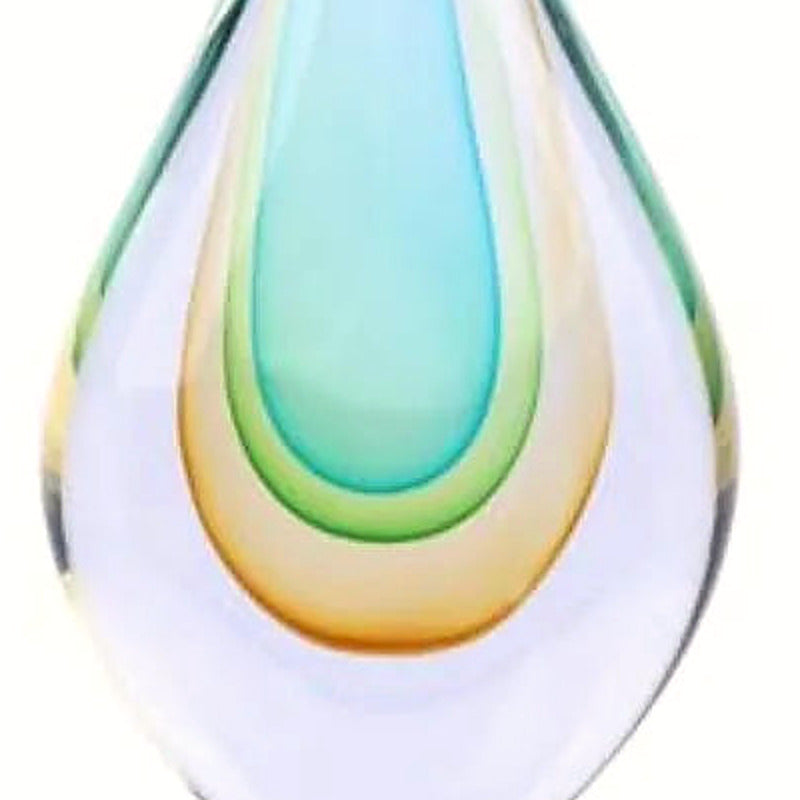 Detail of the amber base glow within the hand-blown glass form