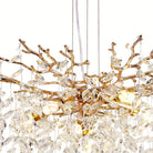 Detail of interlocking gold branches and crystal pendants at the heart of the chandelier