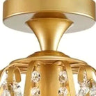 Detail of the brushed gold canopy and decorative scrolls