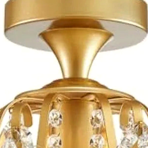 Detail of the brushed gold canopy and decorative scrolls