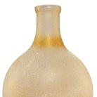 Detail of the narrow amber neck and rounded rim