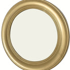 Detail of the deep profile of the brushed gold round mirror frame