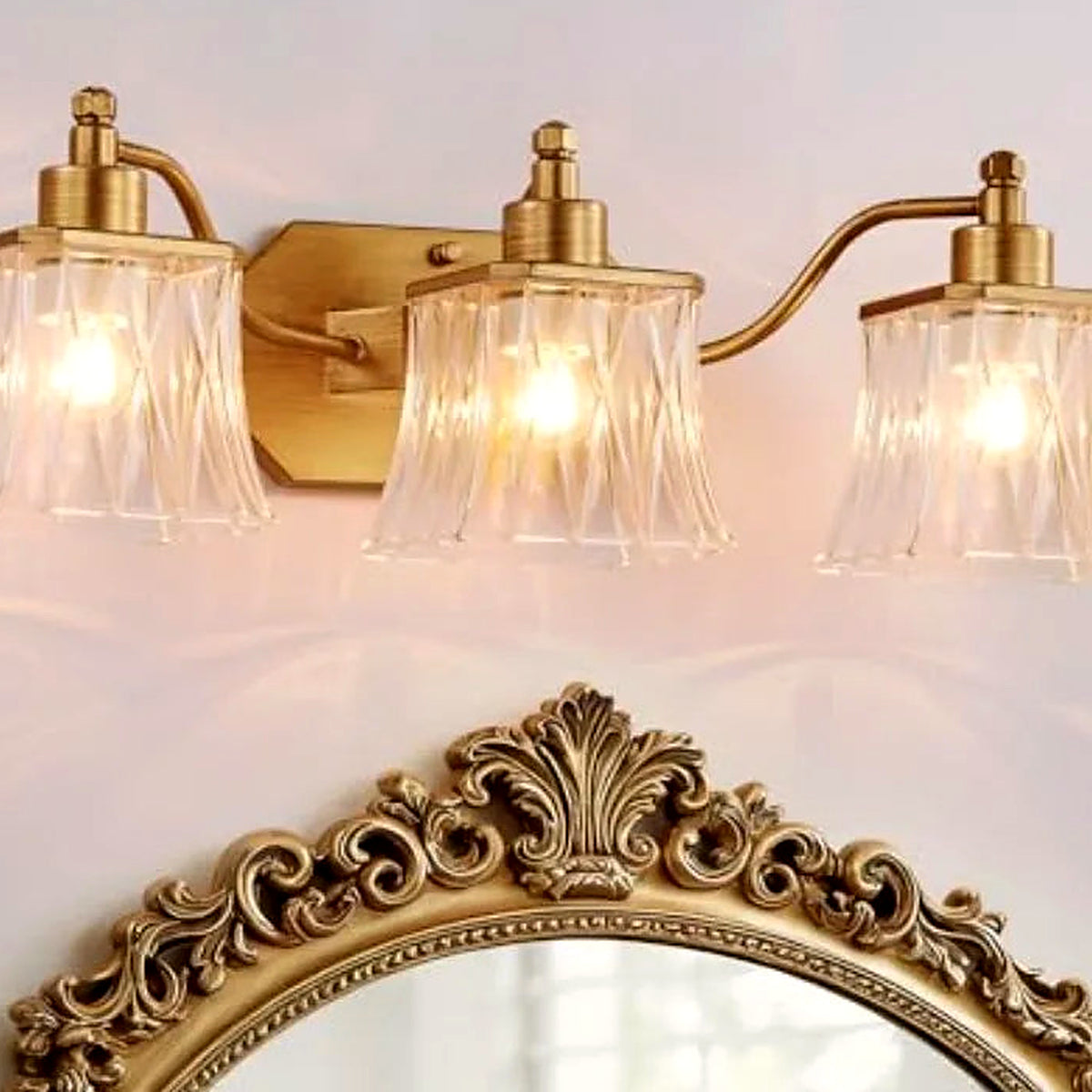 Detail of the brushed gold bar and ribbed crystal shades