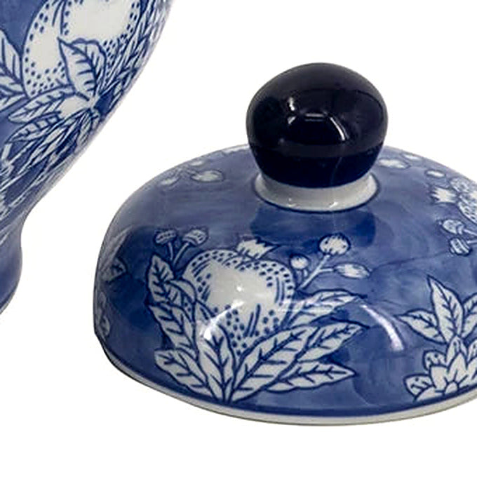 Close-up of the domed porcelain lid with its glossy deep-cobalt finial