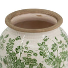Close-up of the green leaf-and-blossom motif on the crackle-glazed vase