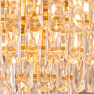 Close-up of faceted raindrop crystal tips catching warm light
