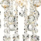 Close-up of faceted crystal spheres at the tips of the strands