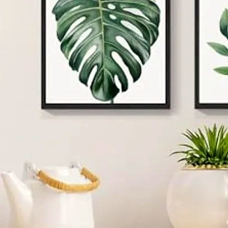 Close-up of the Monstera leaf print from the set of four