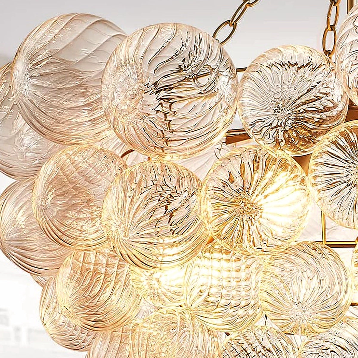 Close-up of the hand-blown ribbed glass texture on the bubble chandelier