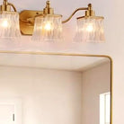 Close-up of a single ribbed crystal shade catching warm light