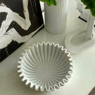 White pleated ceramic centerpiece bowl, 8 in, with ruffled rim (décor shown for styling)