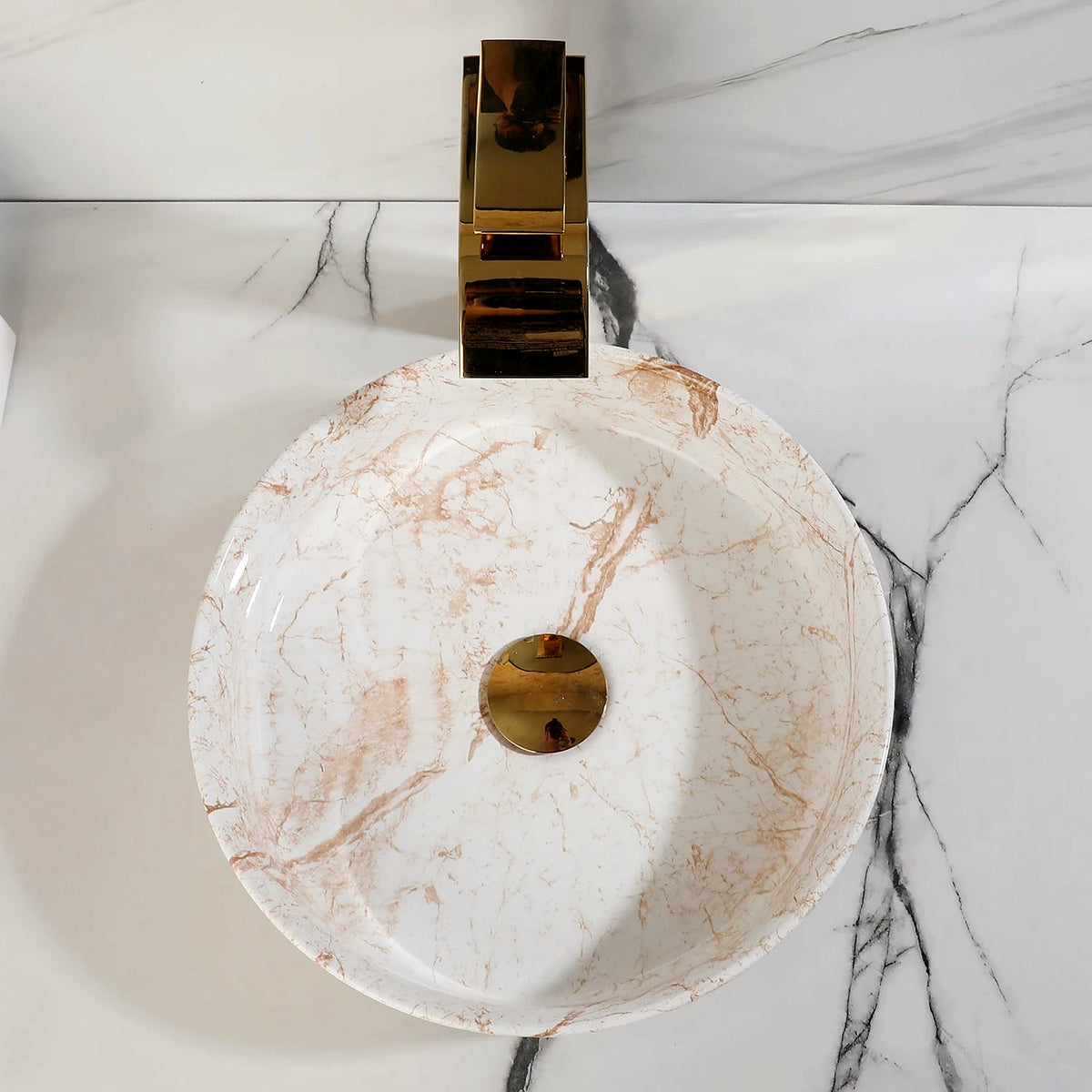 White marble-look ceramic vessel sink, 14 in, with polished gold faucet and drain on a matching marble vanity