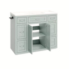 Mint green vanity with cabinet doors open to reveal the interior shelf (faucet not included)