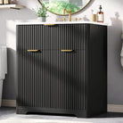 Black fluted vanity at a three-quarter angle showing the vertical reeded texture (faucet shown for styling)