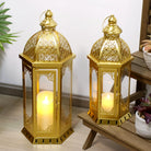 Gold Moroccan candle lanterns, set of 2, styled on a wooden plant stand