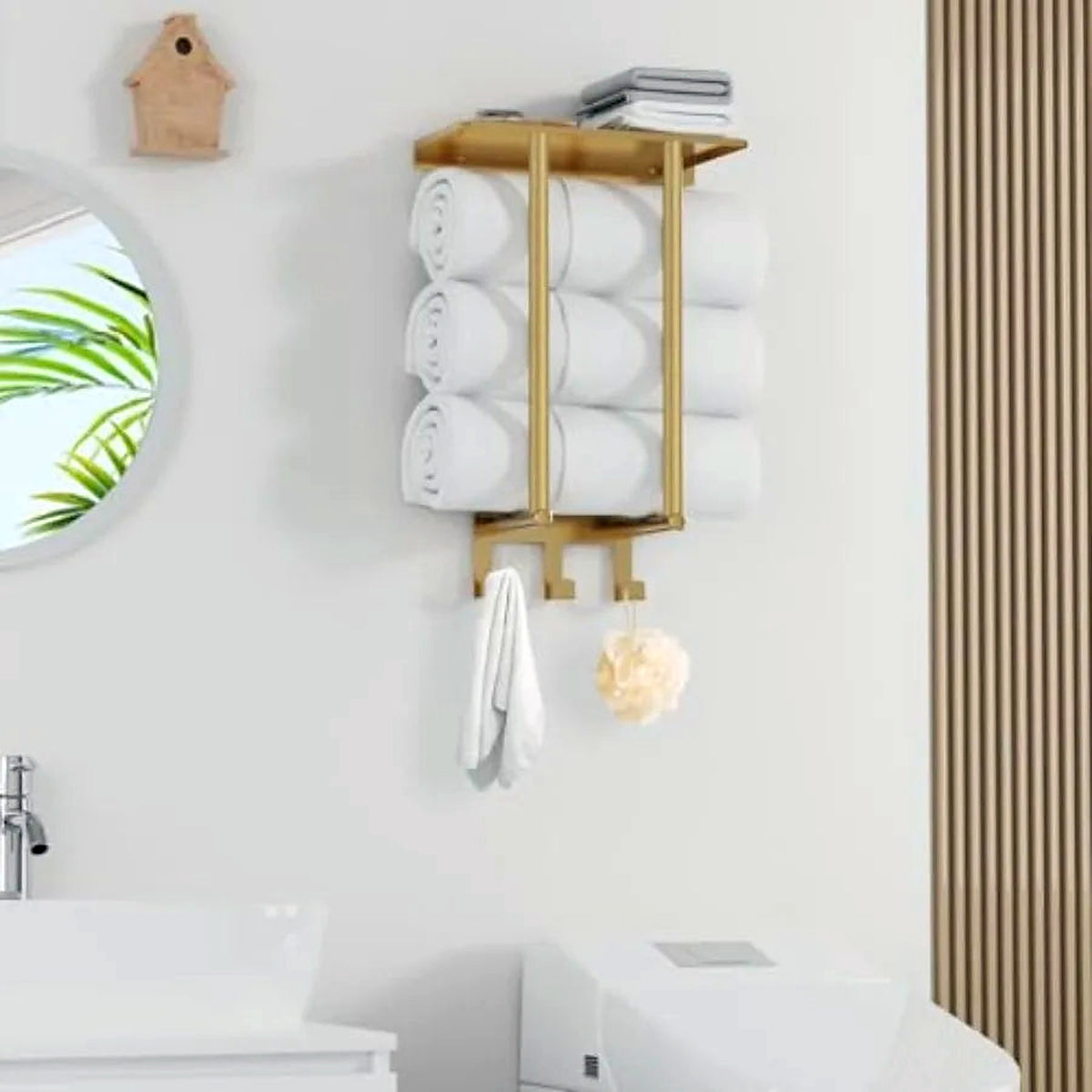 Brushed gold towel rack with shelf installed in a modern bathroom (sink and décor shown for styling)
