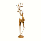 Gold metal deer sculpture with faux crystal antler accents in side profile on a clean white backdrop
