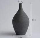 Large grey textured ceramic bud vase with size labels in inches