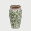 Slow cinematic tour of the white and green floral ceramic vase from real product photography