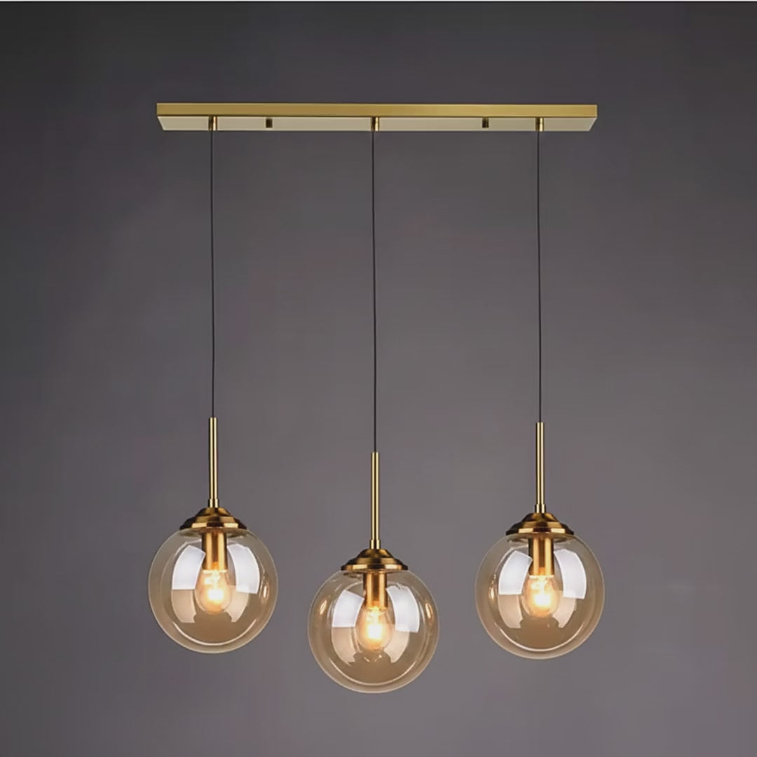 Glass Globe Kitchen Island Pendant Light in Amber, Smoky or Clear video showcase