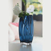 Slow cinematic tour of the heavy blue-teal art glass vase from real product photography