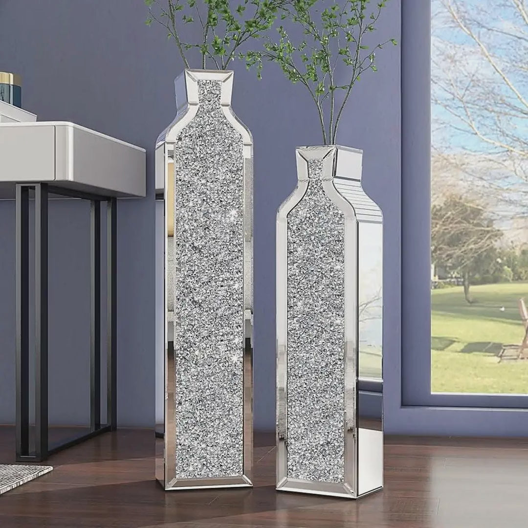 Slow cinematic tour of the pair of mirrored crushed-crystal floor vases in several interiors